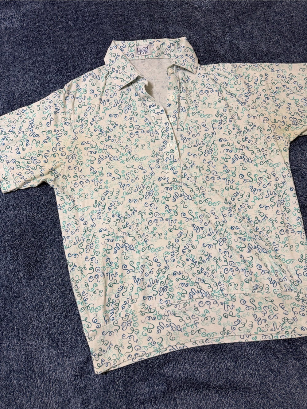 Light Cream short Sleeve Tee with Teal & Navy Swirl Printing